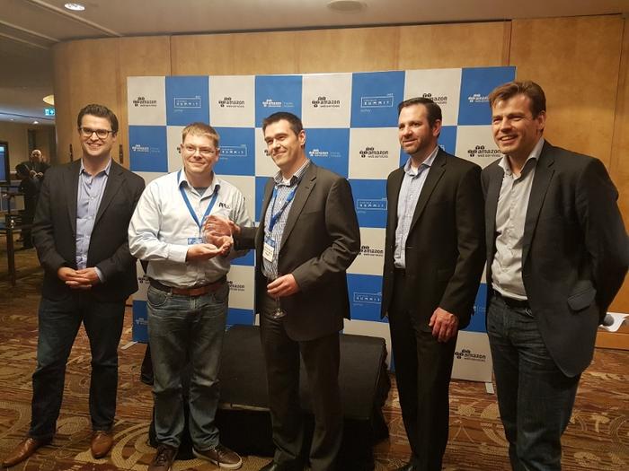 API Talent receiving the rising star award with AWS managing director A/NZ, Paul Migliorini, vice president of channels and alliances, Terry Wise, and Stefan Jansen   